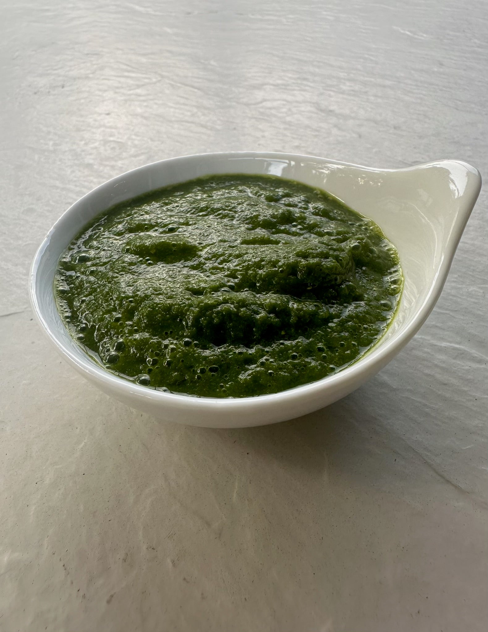 Green Chutney in white bowl