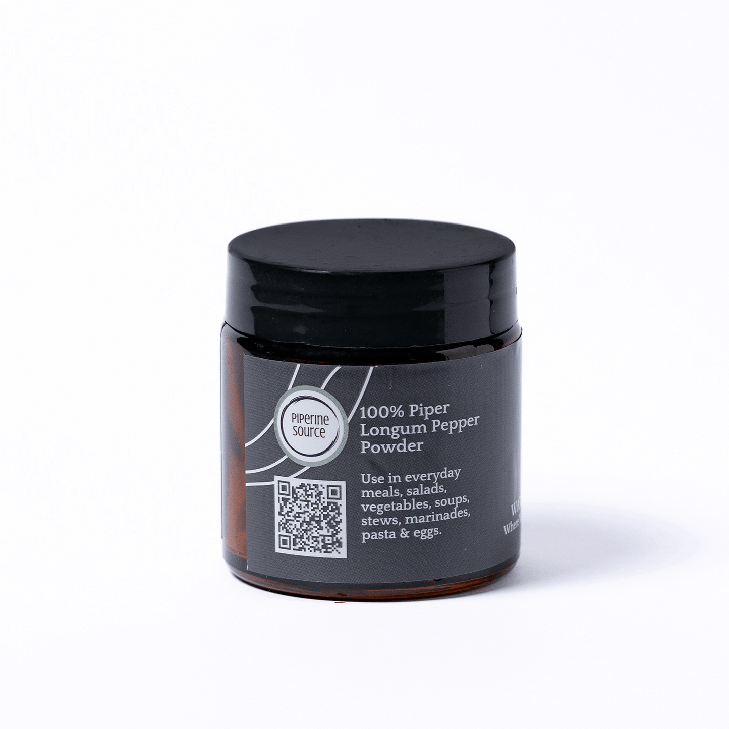 Jar of 100% Piper Longum Pepper Powder with a black lid on a white background