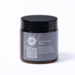 Jar with black lid and gray label on a white background